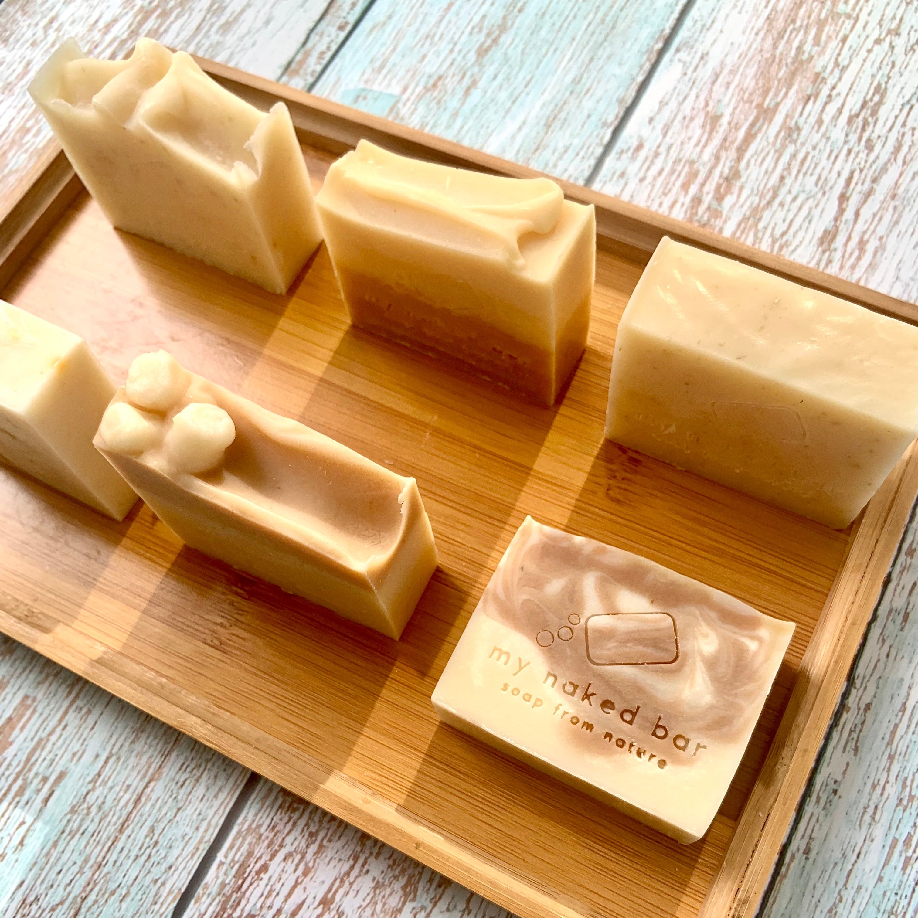 My Naked Bar Eczema friendly collection soaps on a wooden tray